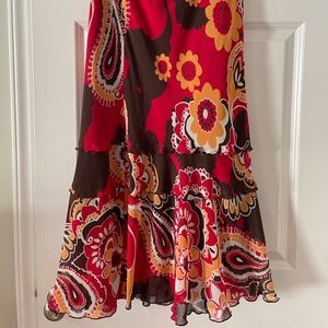 Hippy maxi skirt with vibrant paisley design and ruffles.